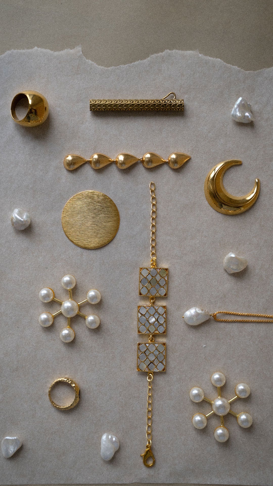 Collection of gold plated and pearl jewellery pieces 