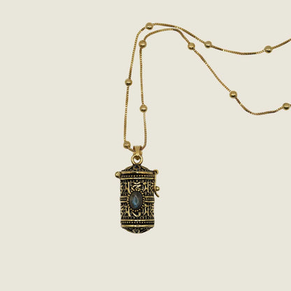 Engraved Tibetan mediation pendant with storage
