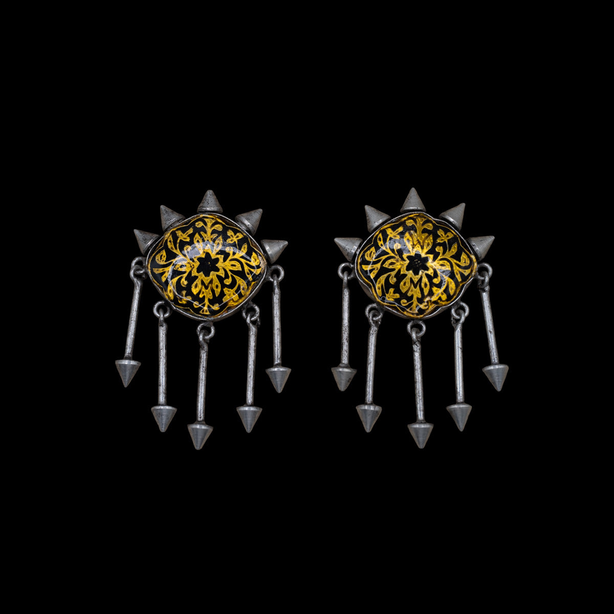 A pair of ornate indian earring with hand-painted meenakari enamel pattern