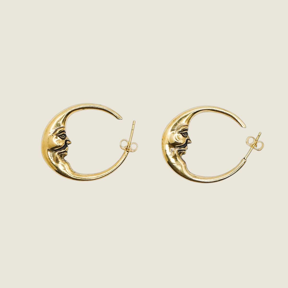 Crescent face hoop earrings 