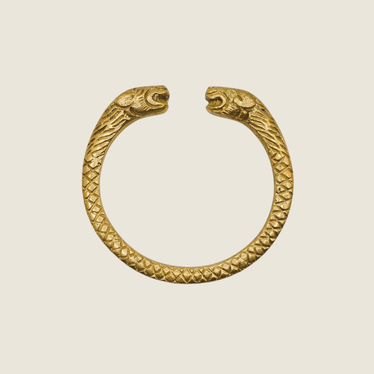 Pure brass bangle with a snake pattern and lion's face