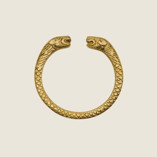 Pure brass bangle with a snake pattern and lion's face