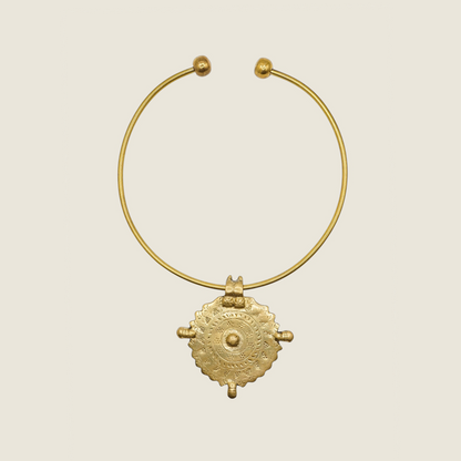 Bohemian brass necklace hasli style with a medallion sun pendant