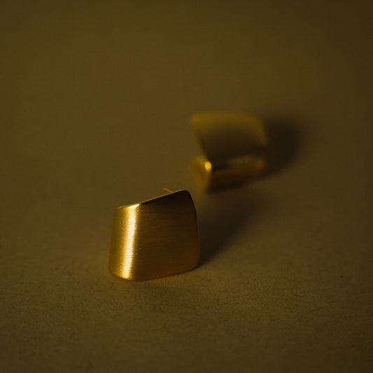 Pair of stainless steel gold-plated curved matte finish earrings